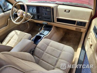 Zdjęcie 8 z 13 samochodu: 1992 JEEP CHEROKEE SPORT VIN:1J4FJ87S4NL248653 - miniatura