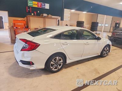 Trzecie zdjęcie samochodu z tyłu: 2016 HONDA CIVIC LX VIN:19XFC2F58GE242911 - miniatura