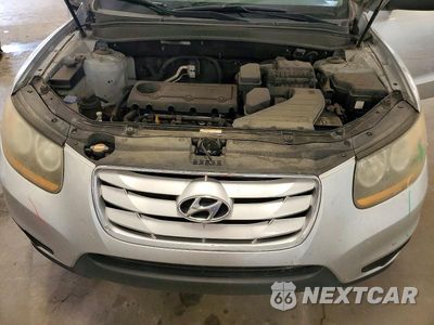 Zdjęcie 12 z 13 samochodu: 2011 HYUNDAI SANTA FE GLS VIN:5XYZGDAB7BG001072 - miniatura