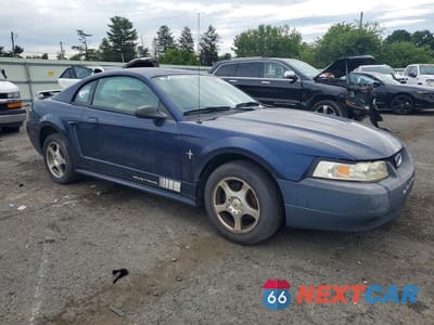 Czwarte zdjęcie samochodu z boku: 2003 FORD MUSTANG VIN:1FAFP40443F317755 - miniatura