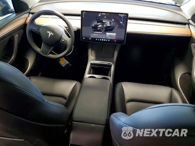 Zdjęcie 8 z 13 samochodu: 2023 TESLA MODEL Y VIN:7SAYGDEE6PF765996 - miniatura