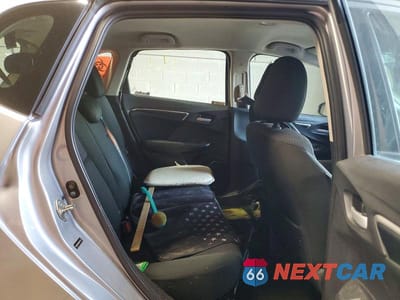 Zdjęcie 11 z 13 samochodu: 2018 HONDA FIT LX VIN:3HGGK5H49JM735413 - miniatura