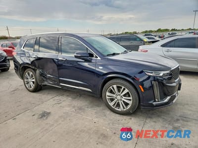 Czwarte zdjęcie samochodu z boku: 2021 CADILLAC XT6 PREMIUM LUXURY VIN:1GYKPDRS6MZ222568 - miniatura