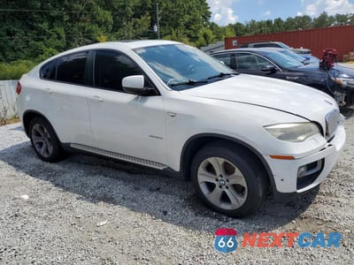 Czwarte zdjęcie samochodu z boku: 2014 BMW X6 XDRIVE35I VIN:5UXFG2C58E0C44111 - miniatura