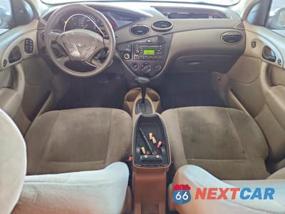 Zdjęcie 8 z 13 samochodu: 2000 FORD FOCUS SE VIN:1FAFP3630YW229639 - miniatura