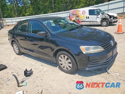 Czwarte zdjęcie samochodu z boku: 2016 VOLKSWAGEN JETTA S VIN:3VW267AJ7GM374486 - miniatura