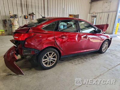 Trzecie zdjęcie samochodu z tyłu: 2017 FORD FOCUS SE VIN:1FADP3FE7HL332342 - miniatura