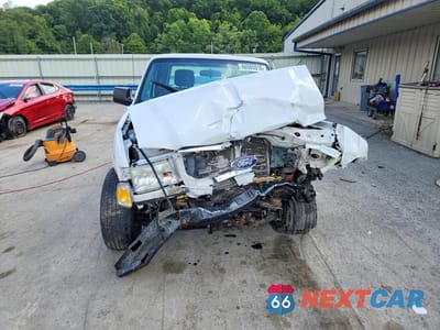 Piąte zdjęcie samochodu w środku: 2011 FORD RANGER SUPER CAB VIN:1FTLR4FE0BPA41963 - miniatura