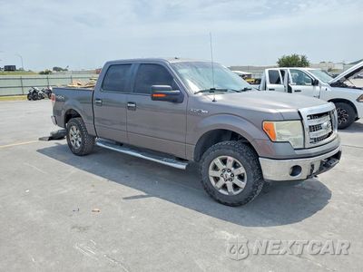 Czwarte zdjęcie samochodu z boku: 2014 FORD F150 SUPERCREW VIN:1FTFW1EF4EKF53466 - miniatura