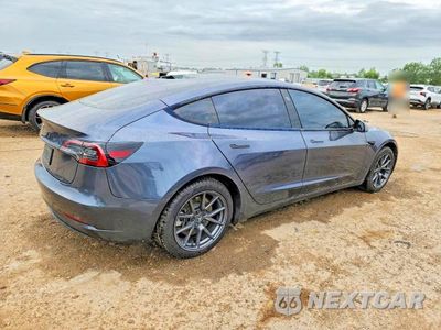 Trzecie zdjęcie samochodu z tyłu: 2023 TESLA MODEL 3 VIN:5YJ3E1EAXPF601563 - miniatura