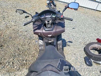 Zdjęcie 6 z 9 samochodu: 2004 HONDA FSC600 D VIN:JH2PF01184K200663 - miniatura