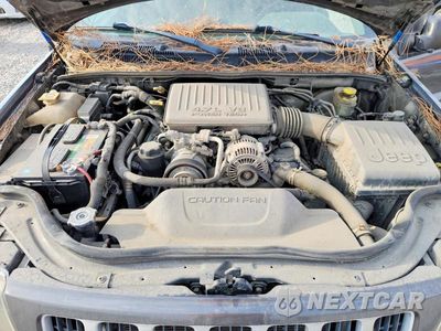 Zdjęcie 11 z 12 samochodu: 2004 JEEP GRAND CHEROKEE LAREDO VIN:1J4GW48N04C370562 - miniatura