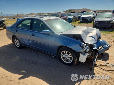Czwarte zdjęcie samochodu z boku: 2004 TOYOTA CAMRY LE V6 VIN:4T1BF32K44U574912 - miniatura