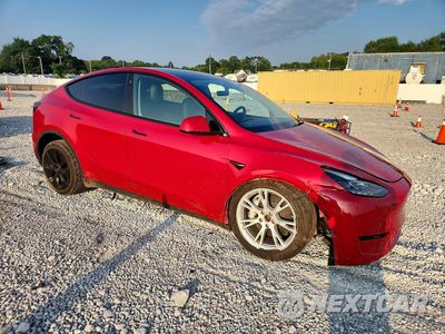 Czwarte zdjęcie samochodu z boku: 2023 TESLA MODEL Y VIN:7SAYGDEE4PF662902 - miniatura