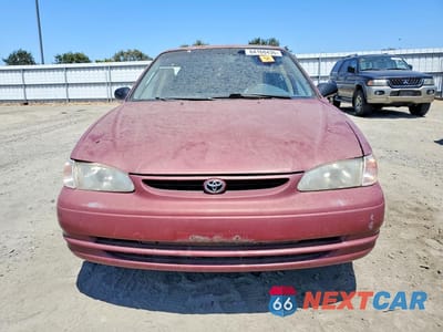 Piąte zdjęcie samochodu w środku: 1999 TOYOTA COROLLA VE VIN:1NXBR12E2XZ212300 - miniatura