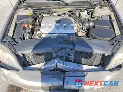 Zdjęcie 11 z 12 samochodu: 2000 CADILLAC DEVILLE DHS VIN:1G6KE57Y9YU226743 - miniatura