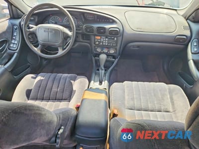 Zdjęcie 8 z 12 samochodu: 1999 PONTIAC GRAND PRIX SE VIN:1G2WJ52M4XF272406 - miniatura