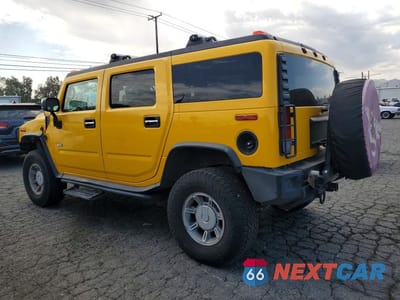 Drugie zdjęcie samochodu z przodu: 2003 HUMMER H2 VIN:5GRGN23U93H121690 - miniatura
