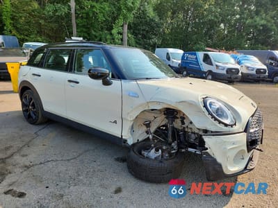 Czwarte zdjęcie samochodu z boku: 2021 MINI COOPER S CLUBMAN ALL4 VIN:WMWXJ1C02M2P46020 - miniatura