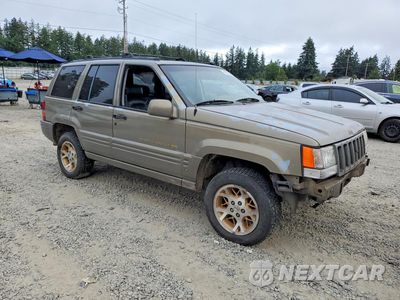 Czwarte zdjęcie samochodu z boku: 1996 JEEP GRAND CHEROKEE LIMITED VIN:1J4GZ78Y3TC311782 - miniatura