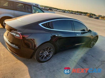 Trzecie zdjęcie samochodu z tyłu: 2018 TESLA MODEL 3 VIN:5YJ3E1EA2JF172376 - miniatura