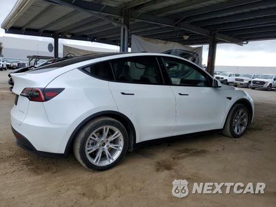 Trzecie zdjęcie samochodu z tyłu: 2023 TESLA MODEL Y VIN:7SAYGDEE3PF967484 - miniatura