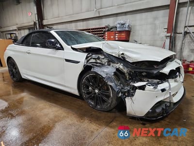Czwarte zdjęcie samochodu z boku: 2014 BMW 650 I VIN:WBAYP9C54ED169042 - miniatura