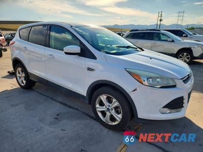 Czwarte zdjęcie samochodu z boku: 2016 FORD ESCAPE SE VIN:1FMCU9G97GUA32212 - miniatura