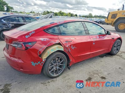 Trzecie zdjęcie samochodu z tyłu: 2022 TESLA MODEL 3 VIN:5YJ3E1EAXNF184796 - miniatura