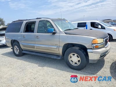 Czwarte zdjęcie samochodu z boku: 2003 GMC YUKON XL C1500 VIN:1GKEC16T13J145569 - miniatura