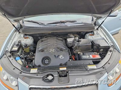 Zdjęcie 12 z 13 samochodu: 2007 HYUNDAI SANTA FE SE VIN:5NMSH73E57H110554 - miniatura