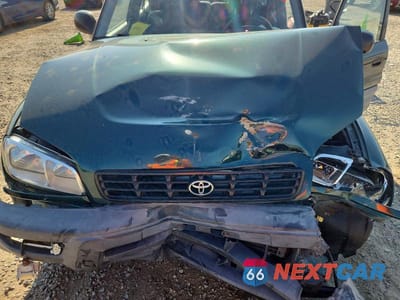 Zdjęcie 12 z 13 samochodu: 1998 TOYOTA RAV4 BASE VIN:JT3GP10V9W7033787 - miniatura
