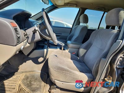 Zdjęcie 7 z 13 samochodu: 1999 JEEP GRAND CHEROKEE LAREDO VIN:1J4GW58S5XC687799 - miniatura