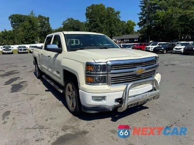 Czwarte zdjęcie samochodu z boku: 2014 CHEVROLET SILVERADO K1500 HIGH COUNTRY VIN:3GCUKTEC4EG386442 - miniatura