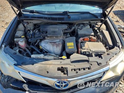 Zdjęcie 11 z 12 samochodu: 2014 TOYOTA CAMRY HYBRID XLE VIN:4T1BD1FK1EU104360 - miniatura