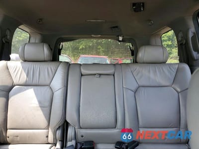 Zdjęcie 10 z 13 samochodu: 2011 HONDA PILOT EXL VIN:5FNYF4H5XBB085426 - miniatura