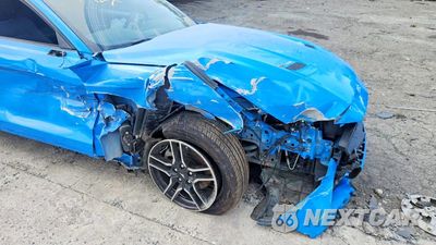 Piąte zdjęcie samochodu w środku: 2022 FORD MUSTANG VIN:1FATP8UH4N5125607 - miniatura