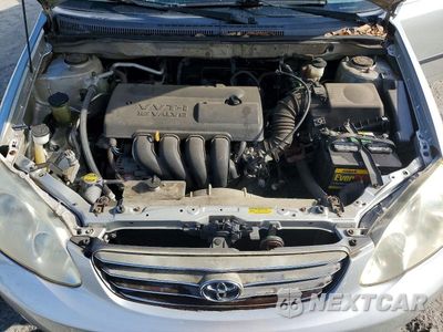 Zdjęcie 11 z 12 samochodu: 2004 TOYOTA COROLLA CE VIN:JTDBR32E442017872 - miniatura