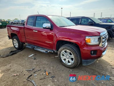 Czwarte zdjęcie samochodu z boku: 2017 GMC CANYON SLT VIN:1GTH6DEN2H1168645 - miniatura