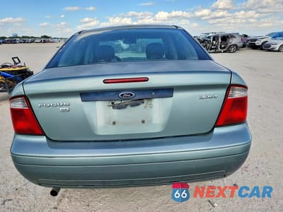 Zdjęcie 6 z 12 samochodu: 2005 FORD FOCUS ZX4 VIN:1FAFP34NX5W272448 - miniatura