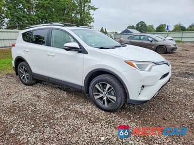 Czwarte zdjęcie samochodu z boku: 2016 TOYOTA RAV4 XLE VIN:JTMRFREV7GD197105 - miniatura