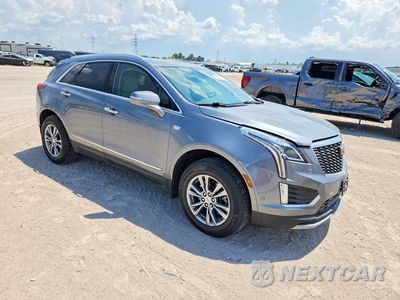 Czwarte zdjęcie samochodu z boku: 2021 CADILLAC XT5 PREMIUM LUXURY VIN:1GYKNCR48MZ119041 - miniatura