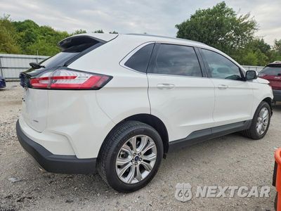 Trzecie zdjęcie samochodu z tyłu: 2022 FORD EDGE TITANIUM VIN:2FMPK4K96NBB09057 - miniatura