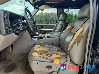 Zdjęcie 7 z 13 samochodu: 2004 CHEVROLET TAHOE K1500 VIN:1GNEK13Z64R145004 - miniatura