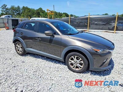Czwarte zdjęcie samochodu z boku: 2016 MAZDA CX-3 SPORT VIN:JM1DKBB71G0123026 - miniatura