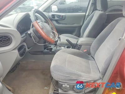 Zdjęcie 7 z 13 samochodu: 2001 HYUNDAI SANTA FE GL VIN:KM8SB82B71U055230 - miniatura
