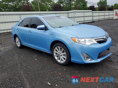 Czwarte zdjęcie samochodu z boku: 2013 TOYOTA CAMRY HYBRID XLE VIN:4T1BD1FK0DU091566 - miniatura