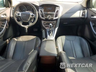 Zdjęcie 8 z 12 samochodu: 2014 FORD FOCUS TITANIUM VIN:1FADP3N22EL195927 - miniatura