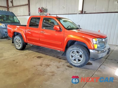 Czwarte zdjęcie samochodu z boku: 2012 GMC CANYON SLE-2 VIN:1GTH6PFEXC8128510 - miniatura