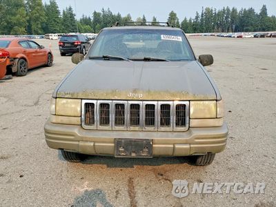 Piąte zdjęcie samochodu w środku: 1998 JEEP GRAND CHEROKEE LAREDO VIN:1J4FX48S3WC236243 - miniatura